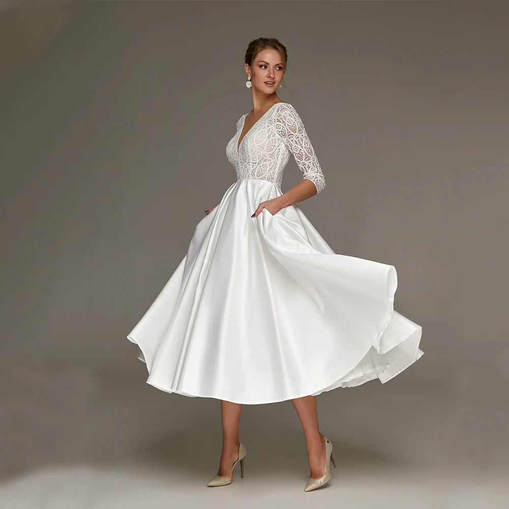 Tea Length Wedding Dress A Line Satin White Bridal Attire, walk down the aisle with effortless elegance in this charming tea length A-line wedding dress.