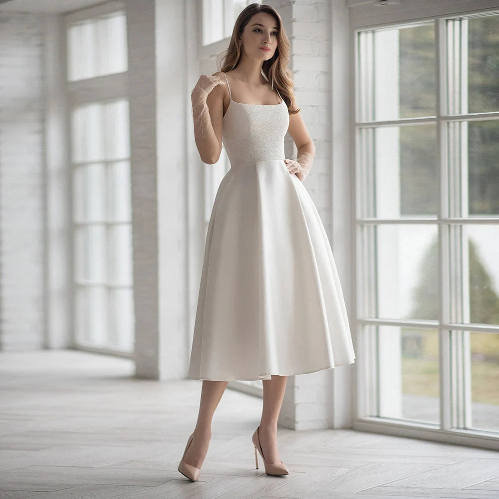 Tea Length Wedding Dress A Line Bridal Gown, embrace warm-weather elegance in this breezy tea length wedding dress designed for the bride 