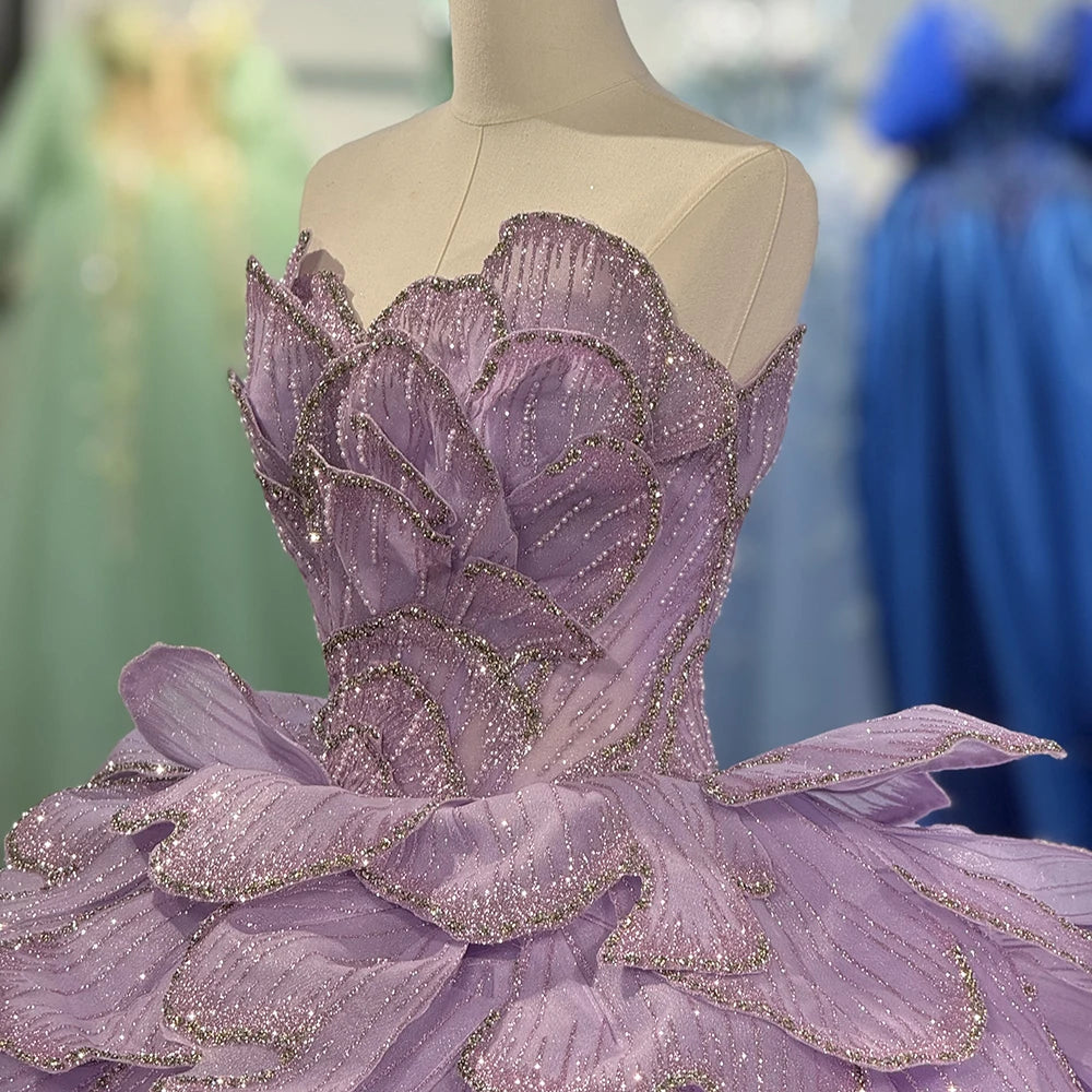 Purple lilac quinceañera dress with sparkling layered bodice and lace-up back, perfect for special events.