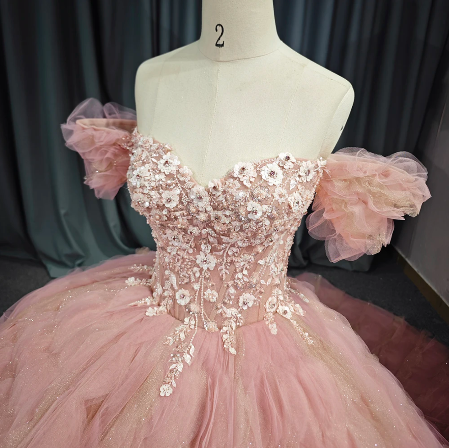 Quinceanera Dress Pink Tulle Lace Ball Gown, Waves of tulle adorn this exquisite party ball gown featuring a puff of tulle off the shoulder cuffs with fitted bodice 