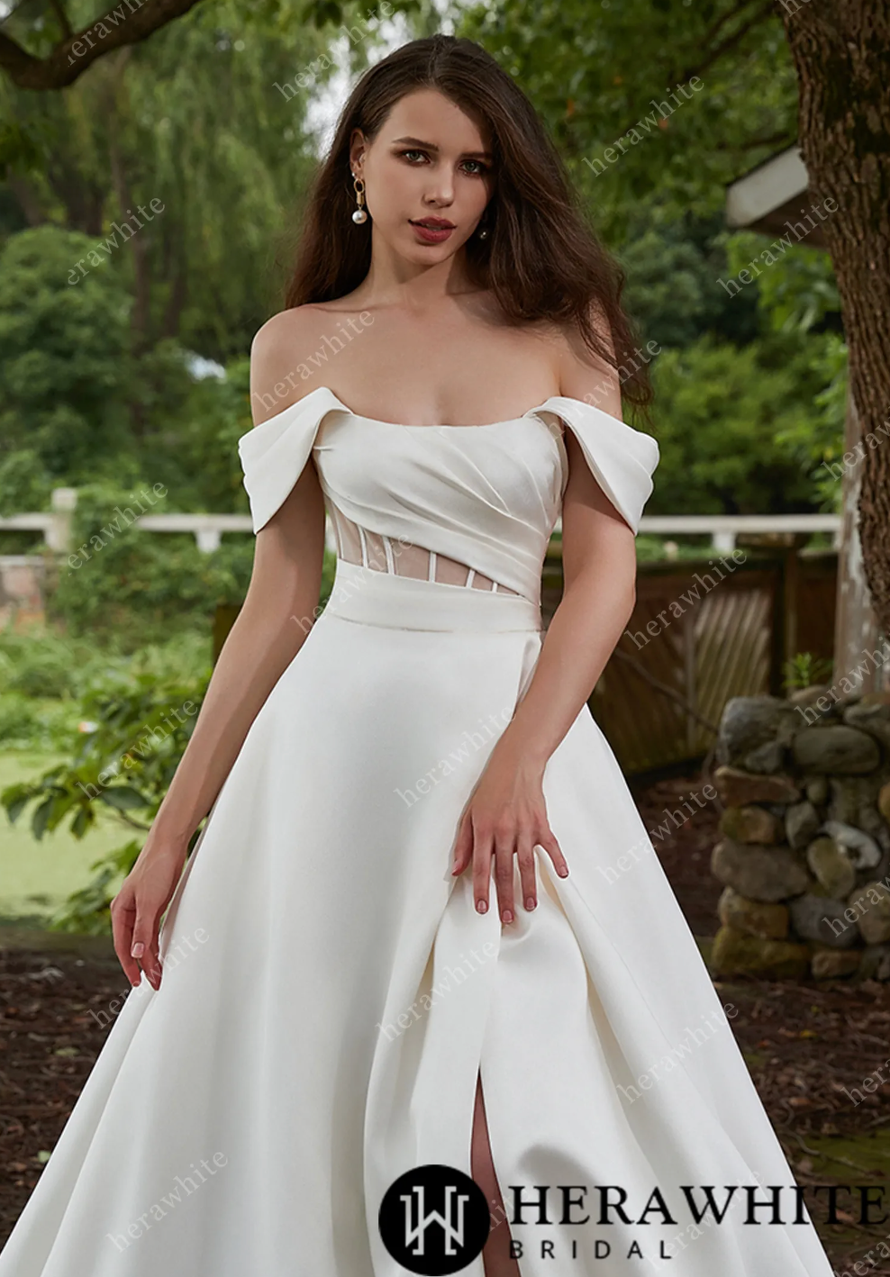 Off-shoulder Grace Mikado wedding dress with illusion cutouts and a thigh-high slit, perfect for modern brides.