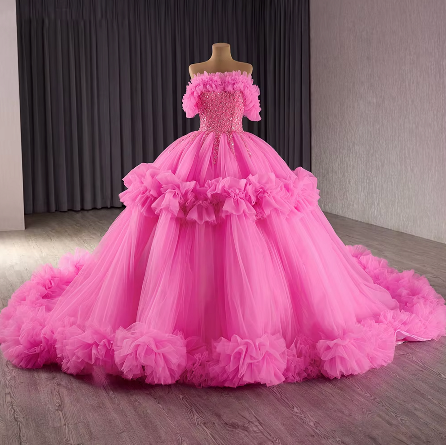 Quinceanera Dress Pink Chiffon Ruffled Ball Gown, Indulge in the striking hot pink ballgown, adorned with a sparkling ruffled beaded bodice and off-the-shoulder cuffs