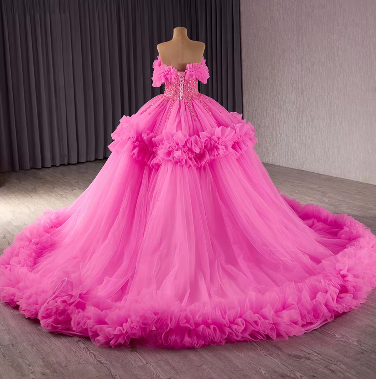 Quinceanera Dress Pink Chiffon Ruffled Ball Gown, Indulge in the striking hot pink ballgown, adorned with a sparkling ruffled beaded bodice and off-the-shoulder cuffs