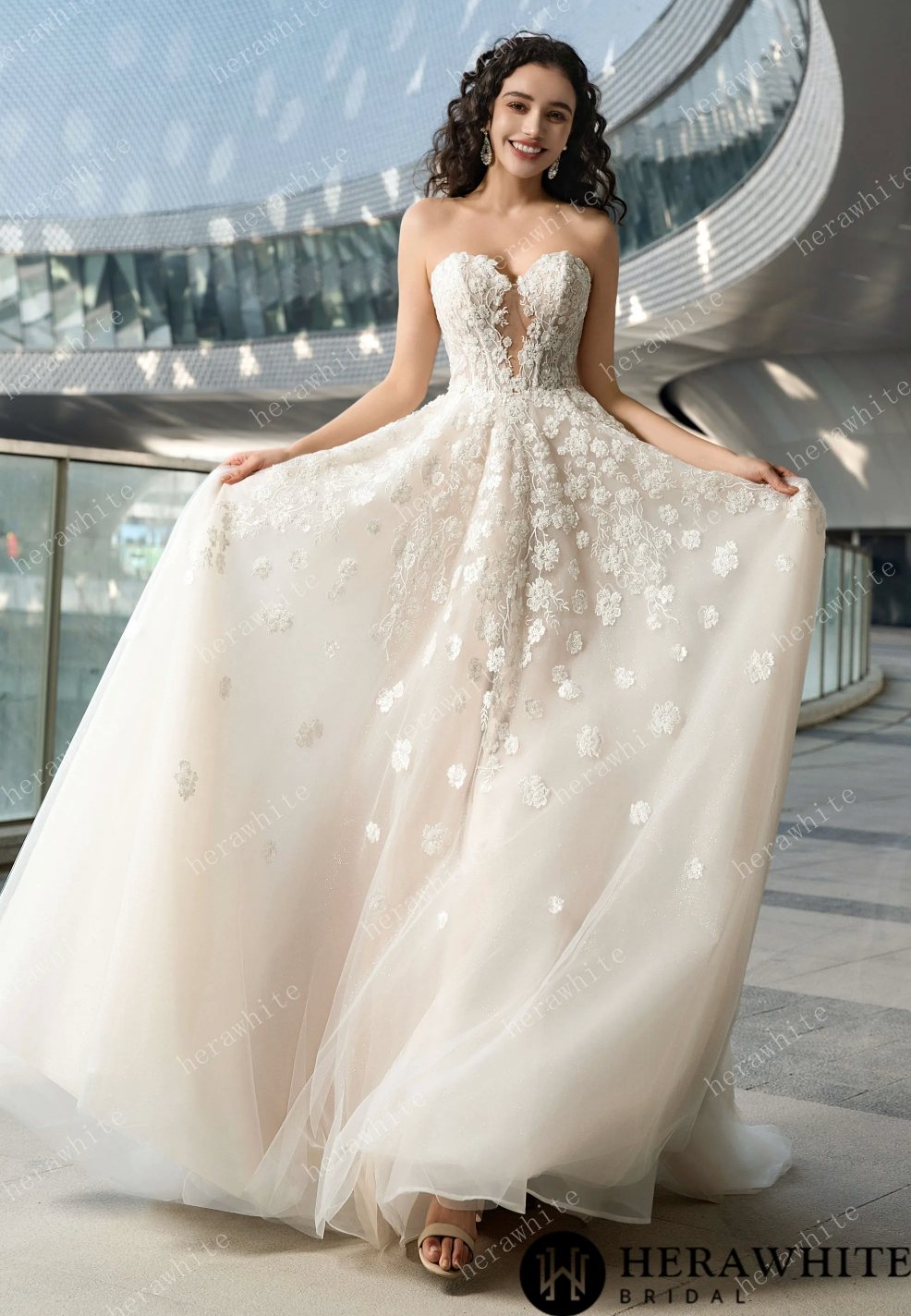 Lace A-line wedding dress with sweetheart neckline, showcasing floral lace details and elegant strapless design.