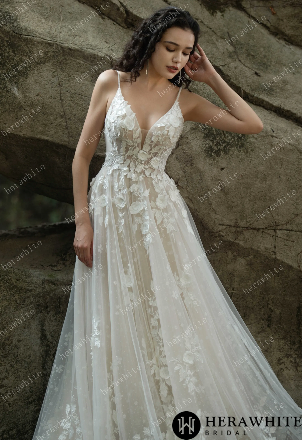 Enchanting V-neck lace wedding dress with floral embroidery and spaghetti straps, perfect for bridal elegance.