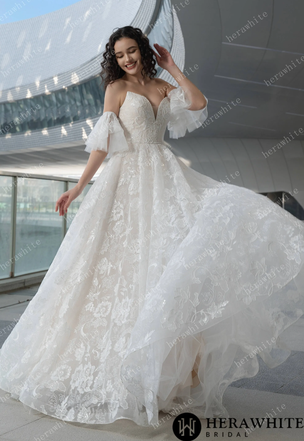 Stunning V-neck allover lace wedding dress with sleeves, showcasing elegance and romantic flair.