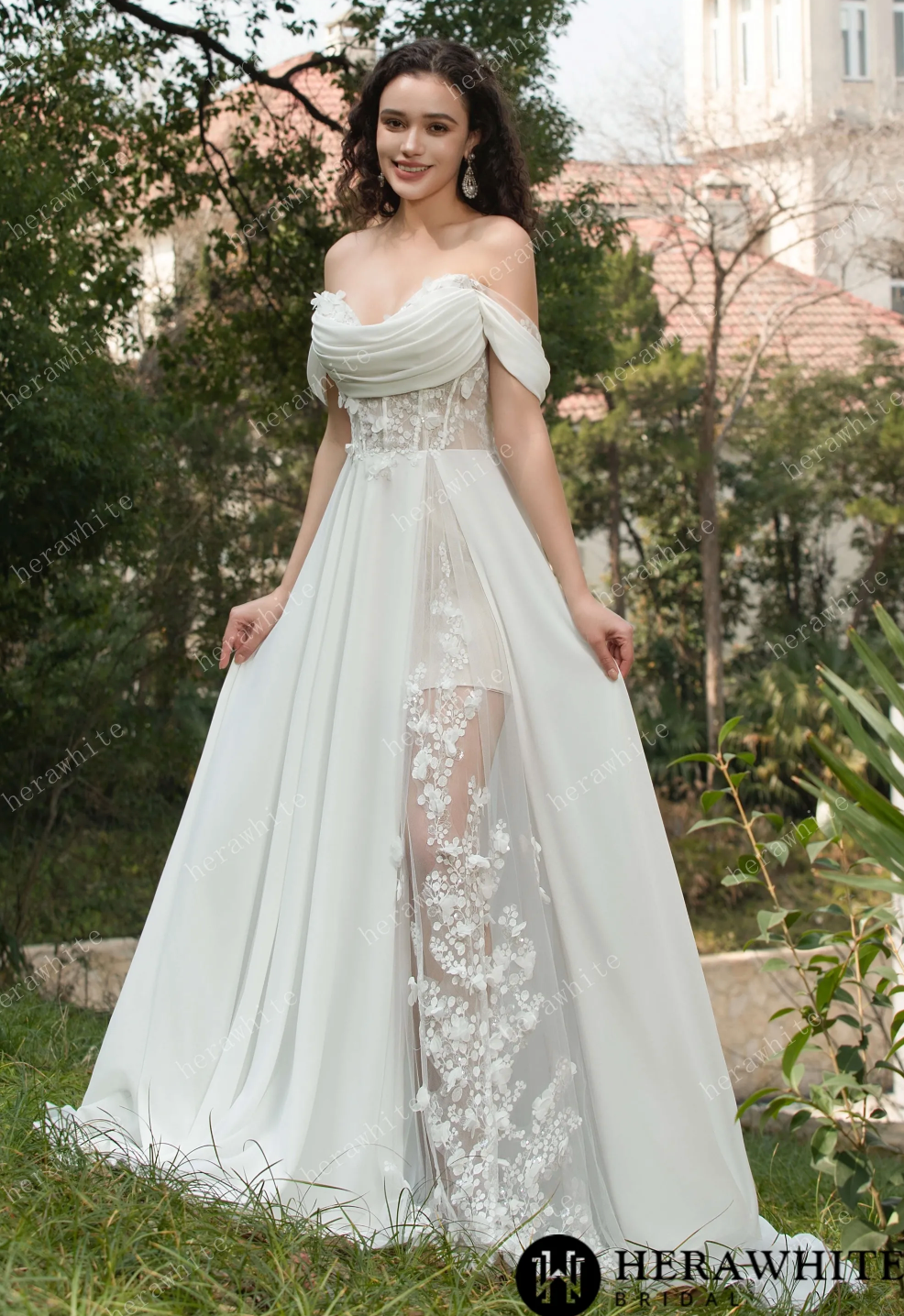 Elegant off the shoulder chiffon wedding dress with lace details and sheer skirt, perfect for a fairytale wedding.
