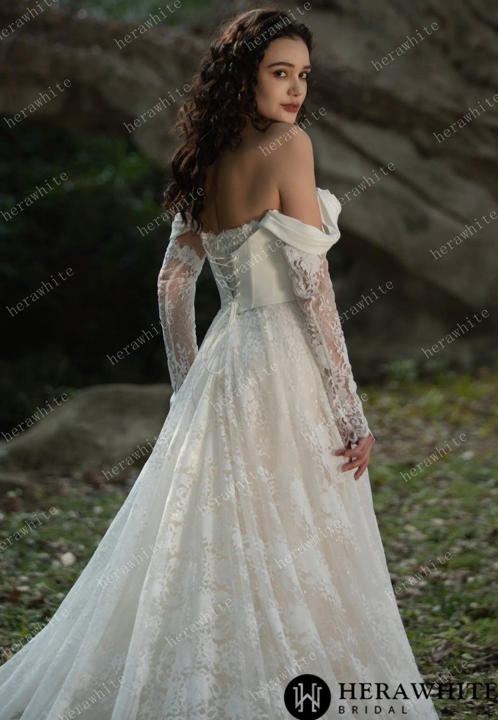 Back view of a lace sweetheart wedding dress with long sleeves and off-the-shoulder neckline, showcasing elegant details.