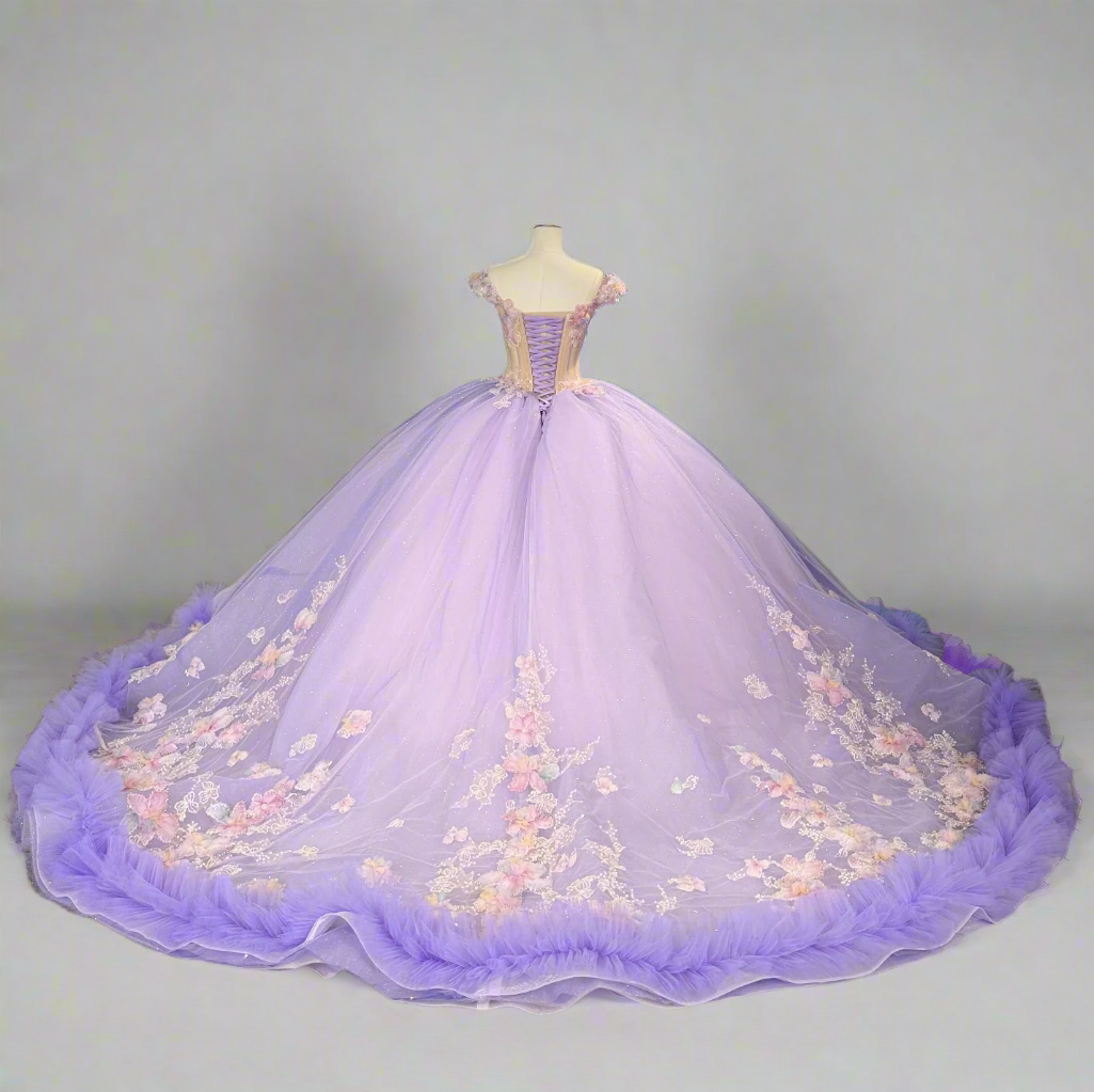 Back view of a stunning purple off the shoulder Quinceanera dress with floral embroidery and a tulle skirt.