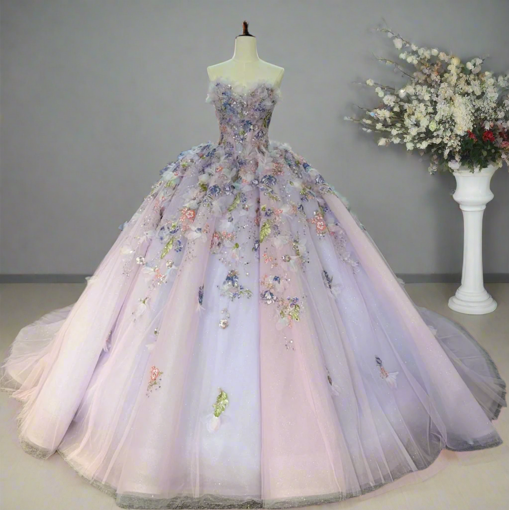 Purple quinceañera dress with floral beadwork, ball gown design and layered skirt for a princess look.