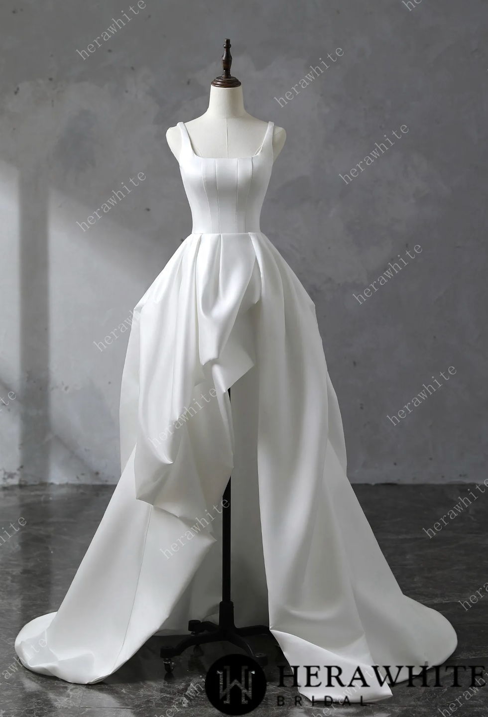 Wedding Dress Draped Satin Bridal Gown with Train, and straps and a deep U neckline, it highlights the décolletage gracefully. The skirt’s rectangular pattern, gathered at the waist, 