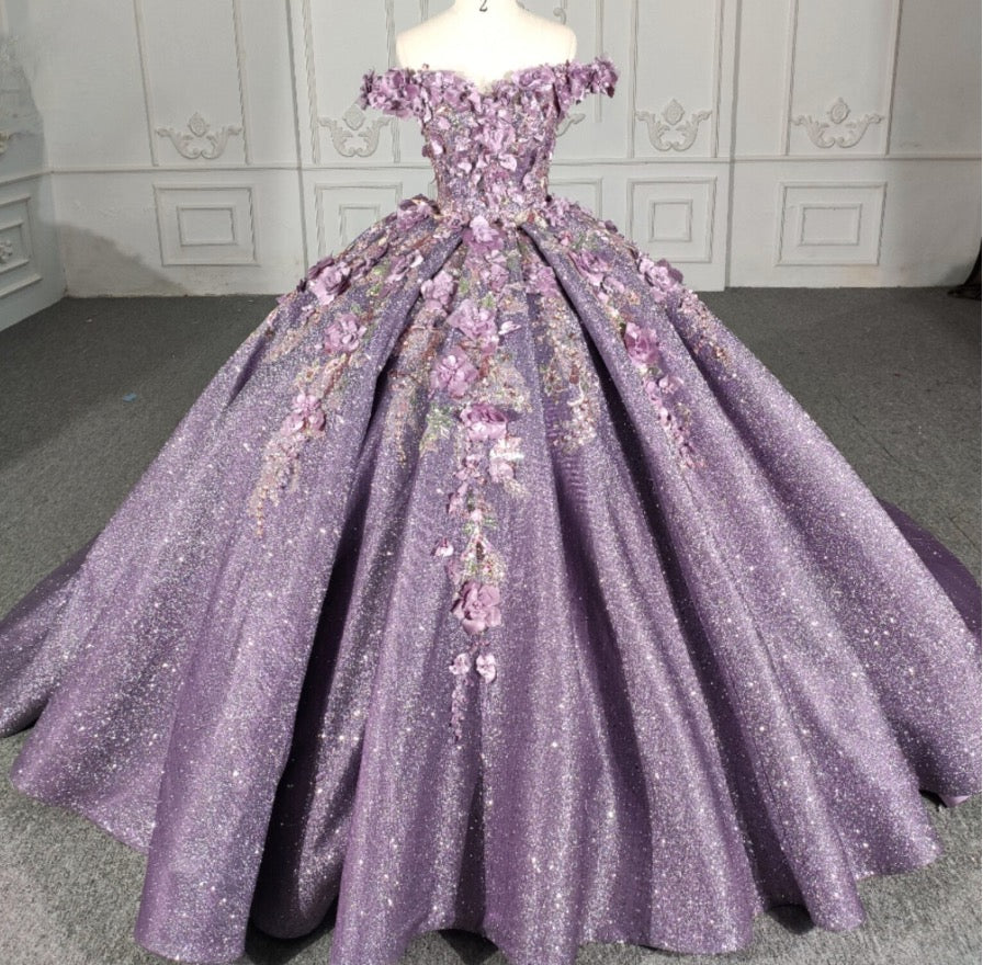 Purple floral A-line sequined ball gown with off-the-shoulder sleeves and sparkling skirt, perfect for parties.
