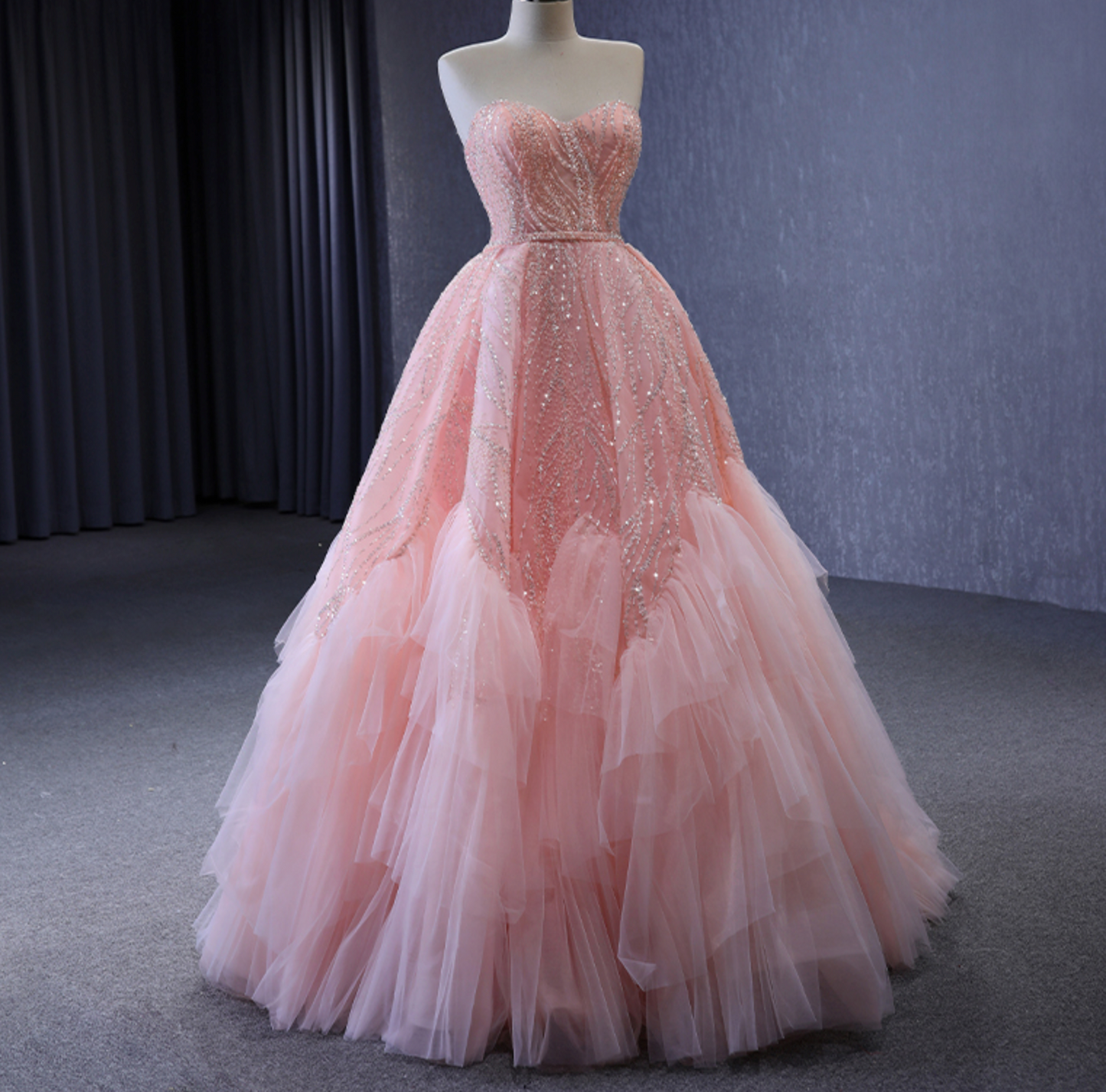 Quinceanera Dress Pink Sequined Organza Ball Gown, A luxurious pink organza garment, boasting a beaded sequined organza overlay with a sleeveless sweetheart bodice 