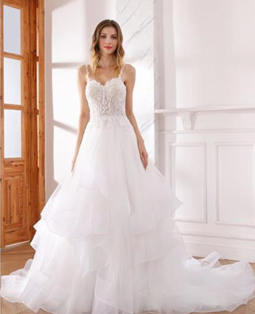Vestido de novia de lujo con volantes y cuentas en forma de A