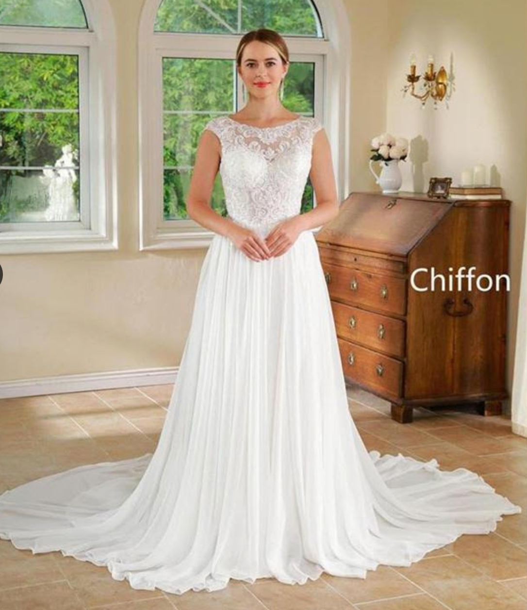 Vestido de novia de encaje, entallado y con vuelo de gasa