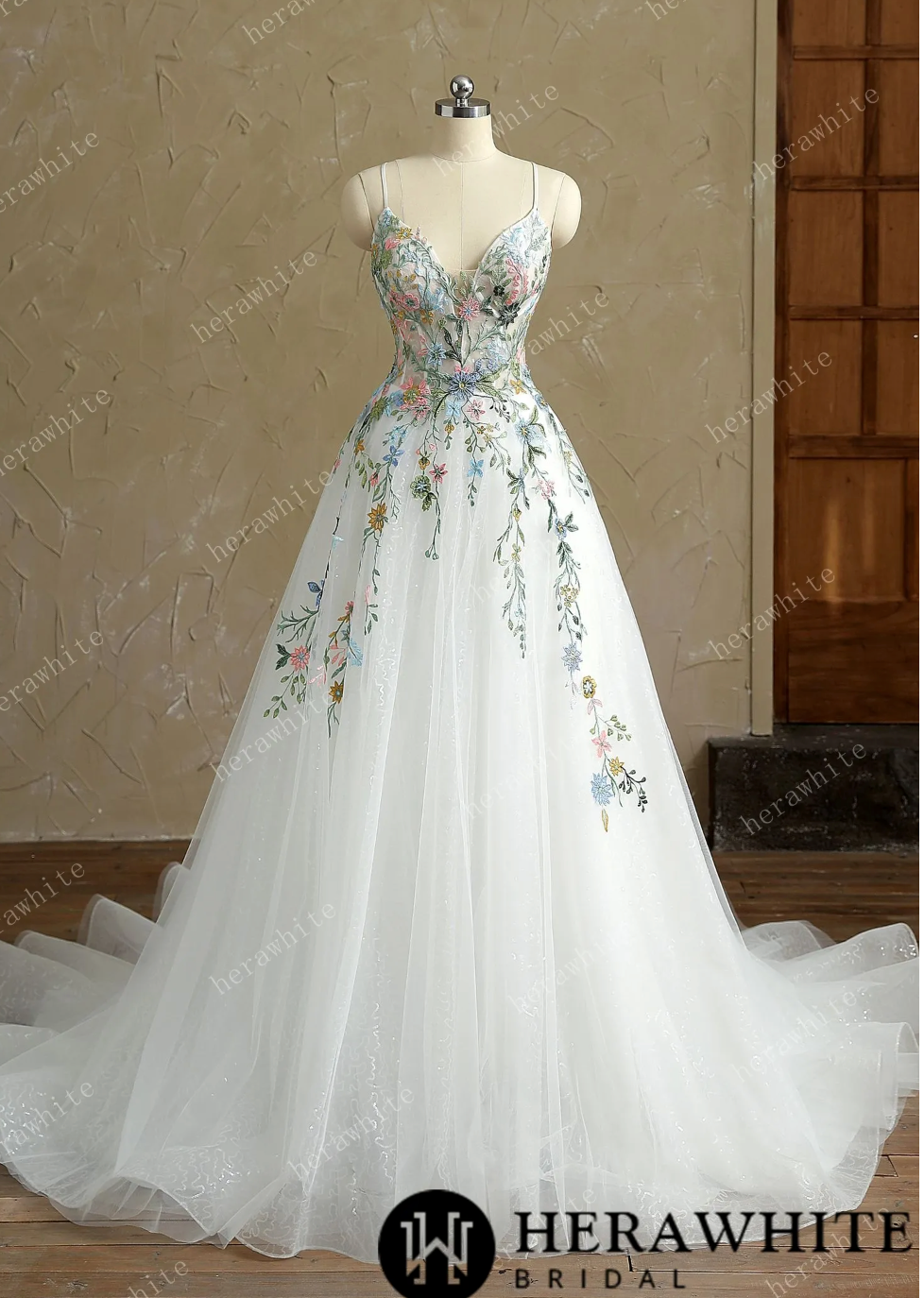 V neck spaghetti strap wedding dress with colorful lace and floral appliques, perfect for a whimsical bridal look.