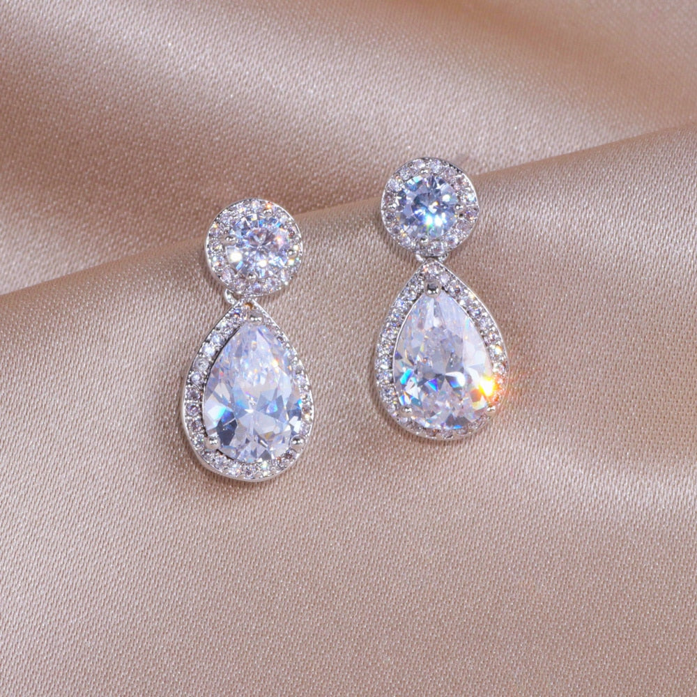 Cubic Zirconia Bridal Earrings Micro Pave Wedding Jewelry Accessory, Classic cubic zirconia earrings featuring a large water drop Cubic Zirconia crystal surround by micro pave