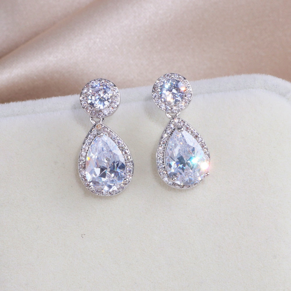 Cubic Zirconia Bridal Earrings Micro Pave Wedding Jewelry Accessory, Classic cubic zirconia earrings featuring a large water drop Cubic Zirconia crystal surround by micro pave