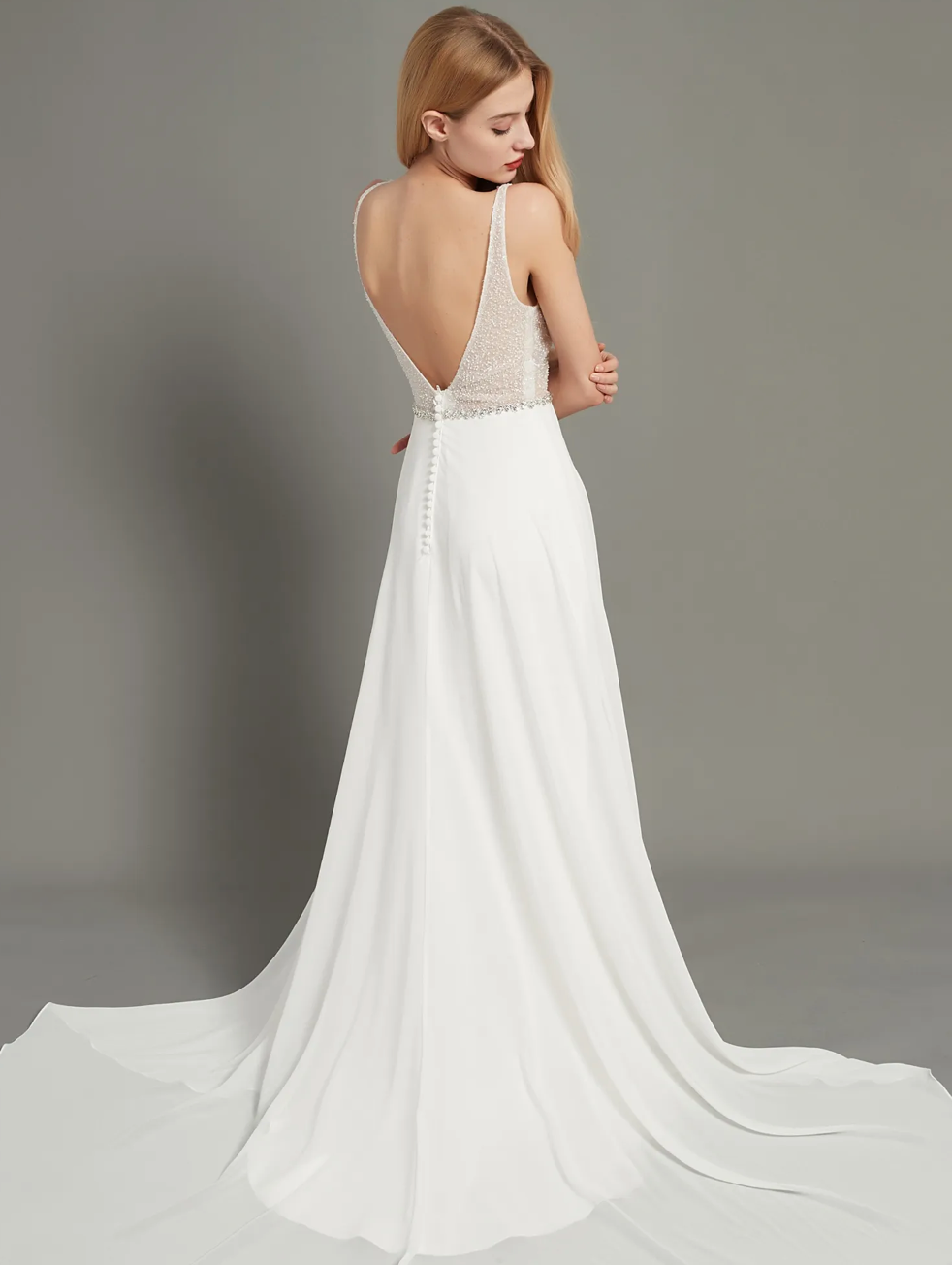 A Line Chiffon Wedding Dress Crystal Beaded Tulle Bridal Gown, an amazing  v-neckline beaded bodice with an a-line silhouette. 