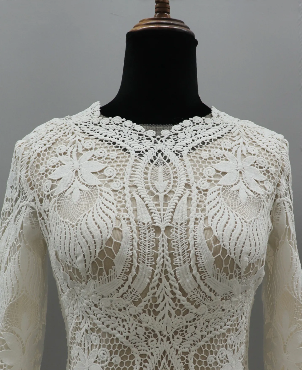 Satin Wedding Dress Fit & Flare Scalloped Train Bridal Gown, this fit-and-flare wedding gown features high neckline and long sleeves. The gown is covered in distinct, highly ornate laces 