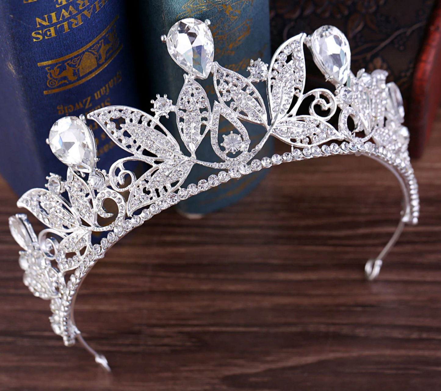 Metal Leaf Crystal Wedding Tiara Bridal Crown Hair Accessory, a classic style metal leaf motif with sparkling crystal complete the look, the perfect wedding or party accessory for your next big event.