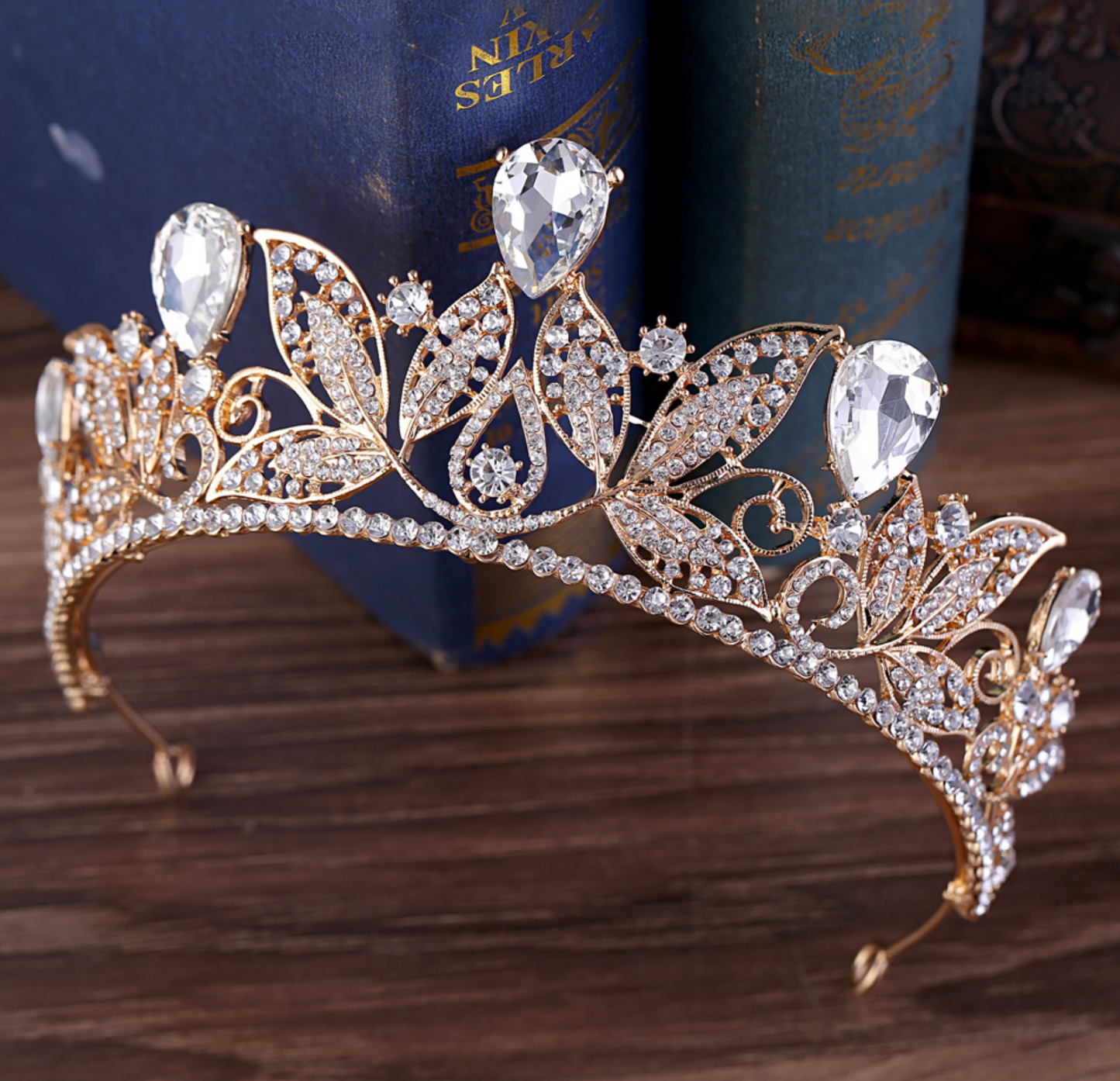 Metal Leaf Crystal Wedding Tiara Bridal Crown Hair Accessory, a classic style metal leaf motif with sparkling crystal complete the look, the perfect wedding or party accessory for your next big event.