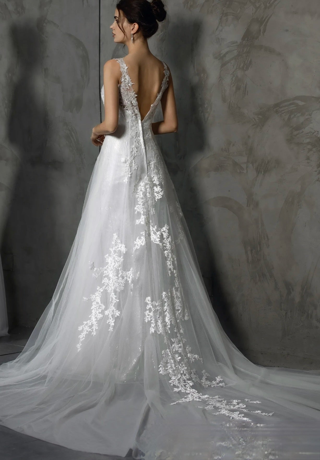 Sleeveless Wedding Dress Lace Satin Sequines A Line Bridal Gown With Train, this sleeveless bridal gown features V-neckline and lace appliqués 