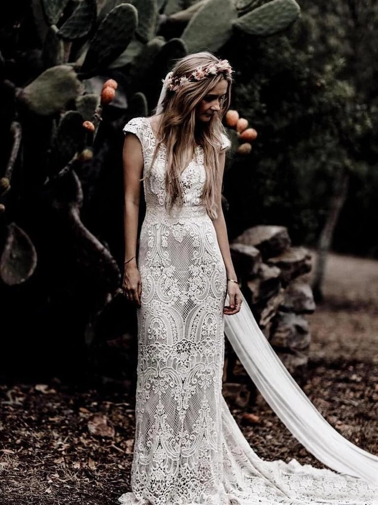 Boho Wedding Dress Deep V-Neck Lace Sheath Bridal Gown, Experience an unforgettable wedding day with our stunning deep V-neck lace sheath bridal dress! This dress showcases a full lace design with a lining, short cap sleeves, a deep V back, and a breathtaking lace sweep train.